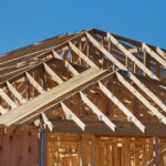 a house under construction with wooden framing